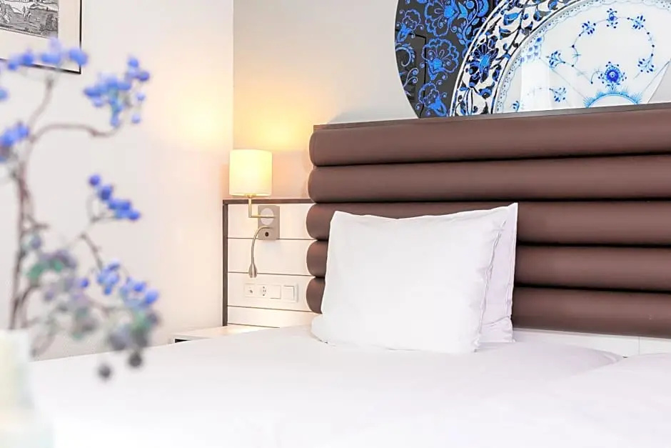 Golden Tulip Hotel Central - Chambres