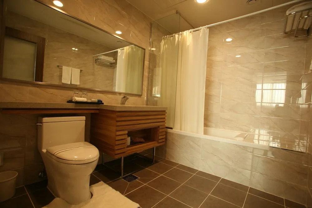 Hyunjin Tourist Hotel - Chambres