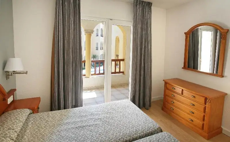 Apartamentos Turísticos Jardines del Plaza - Chambres