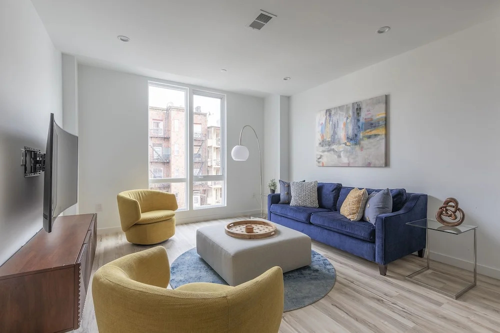 Sun-kissed 3BR Loft With Patio Minutes to NYC