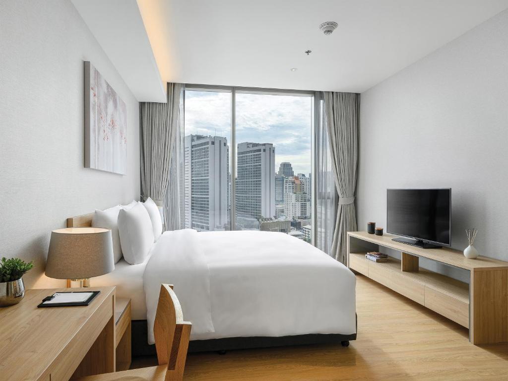 Апартаменты Deluxe с 2 комнатами в Oakwood Suites Bangkok
