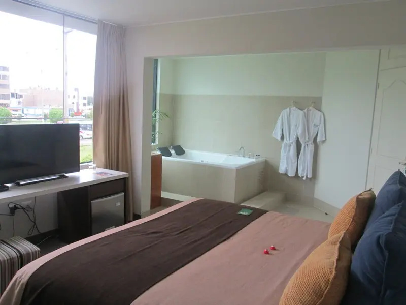 Palmetto Hotel Business La Perla - Chambres
