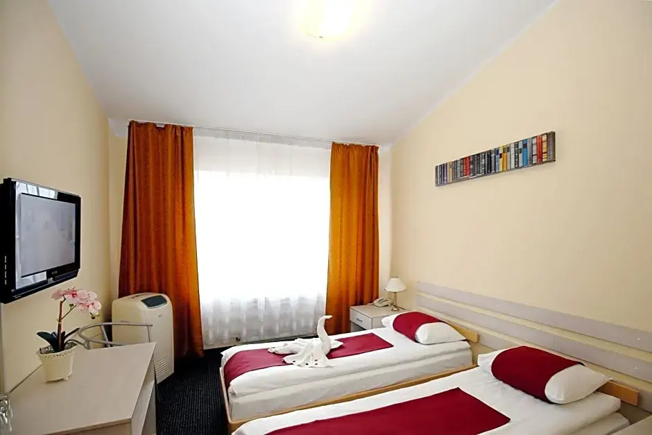 Apart Hotel TOMO - Chambres
