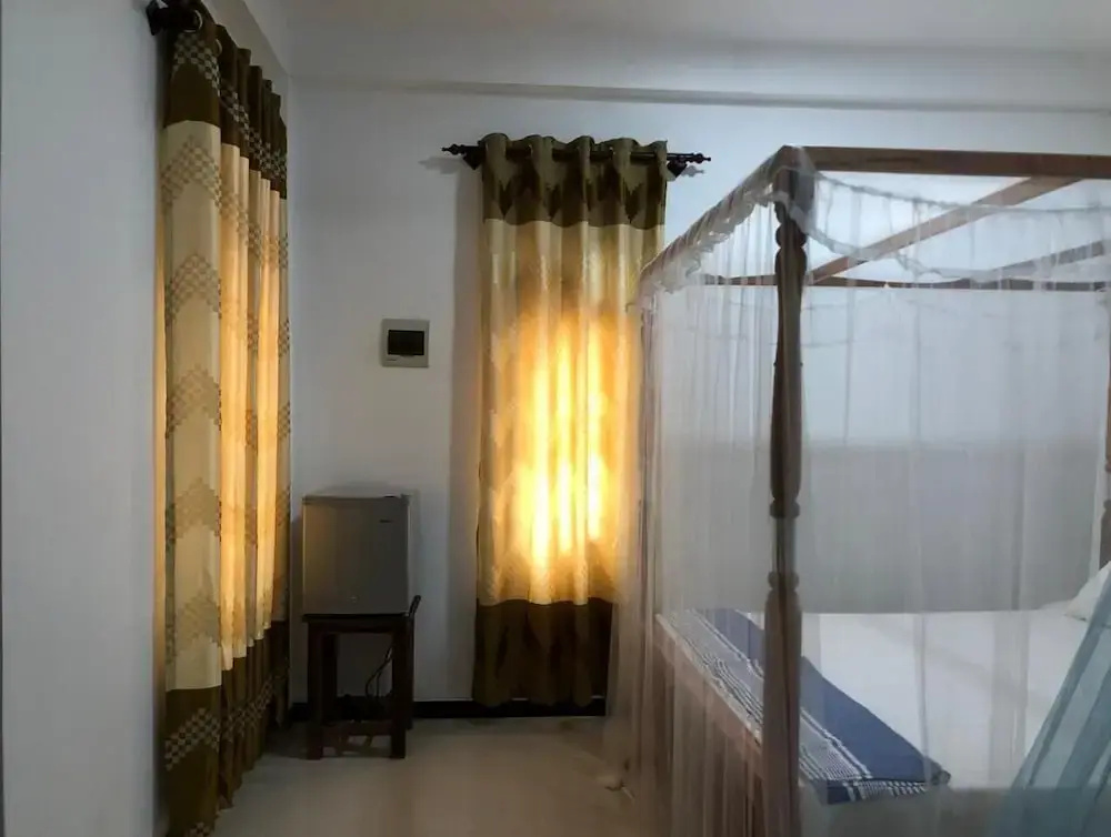 Calm Garden Cabanas - Chambres