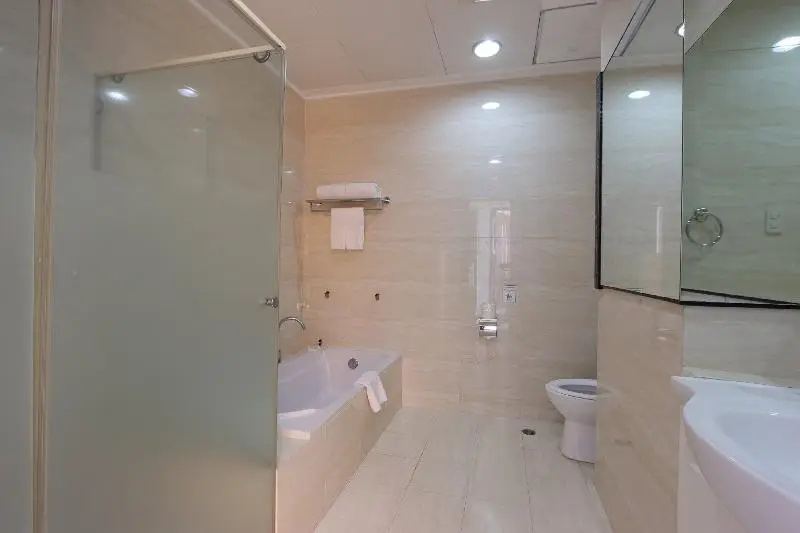 Paseo Premiere Hotel - Chambres