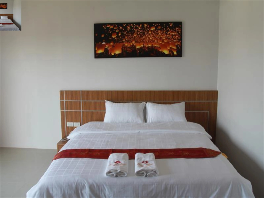 Tawan Anda Garden Hotel - Chambres