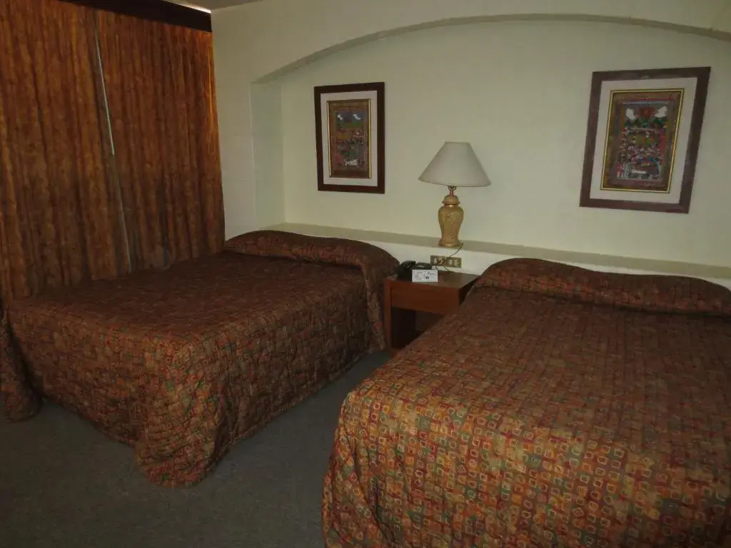 Hotel Las Palmas Midway Inn - Chambres