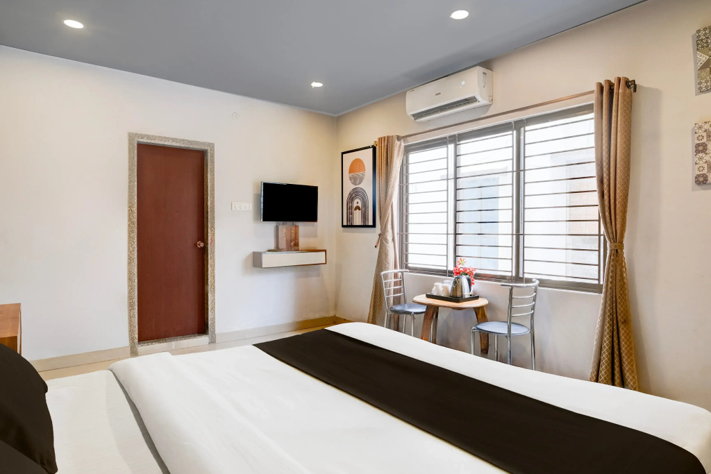 OYO Premium Beltola Tiniali - Chambres
