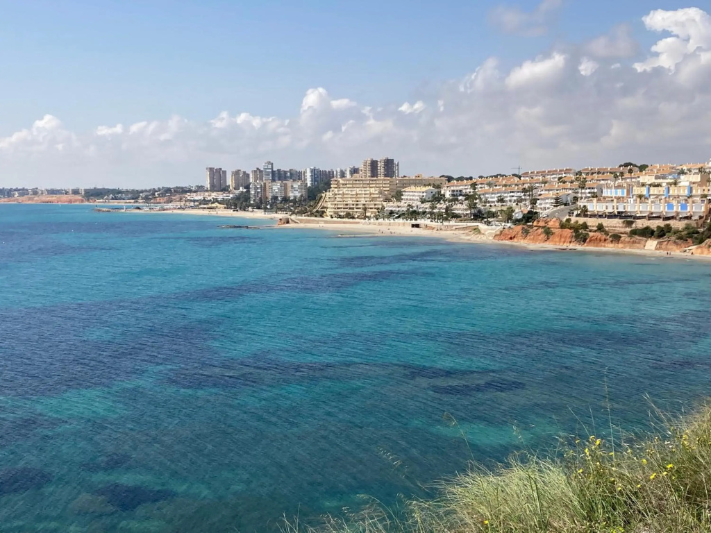 Beautiful location in Cabo Roig Orihuela-Costa at Playamarina II with a private roof terrace and two balconies
