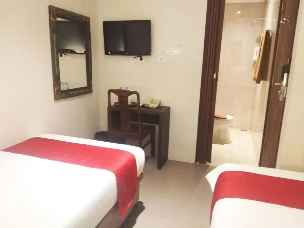 Sukajadi Hotel - Chambres