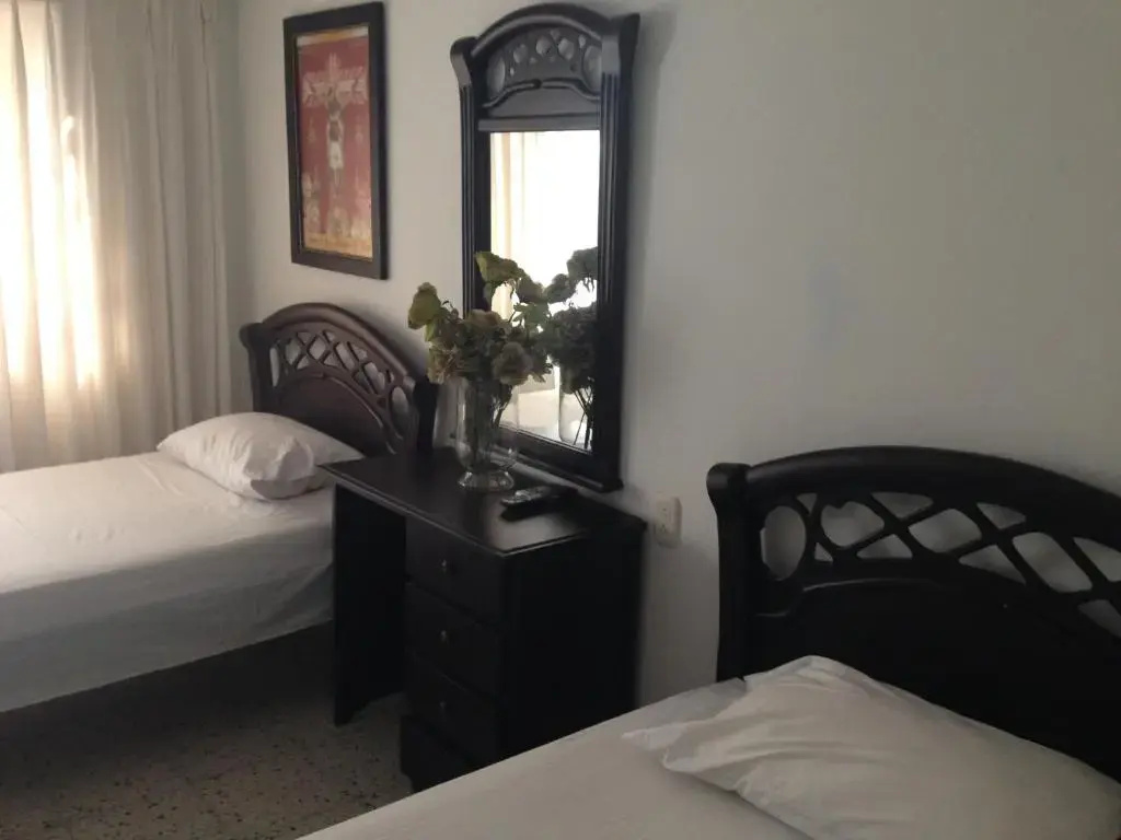 Casa Hotel Miriam - Chambres