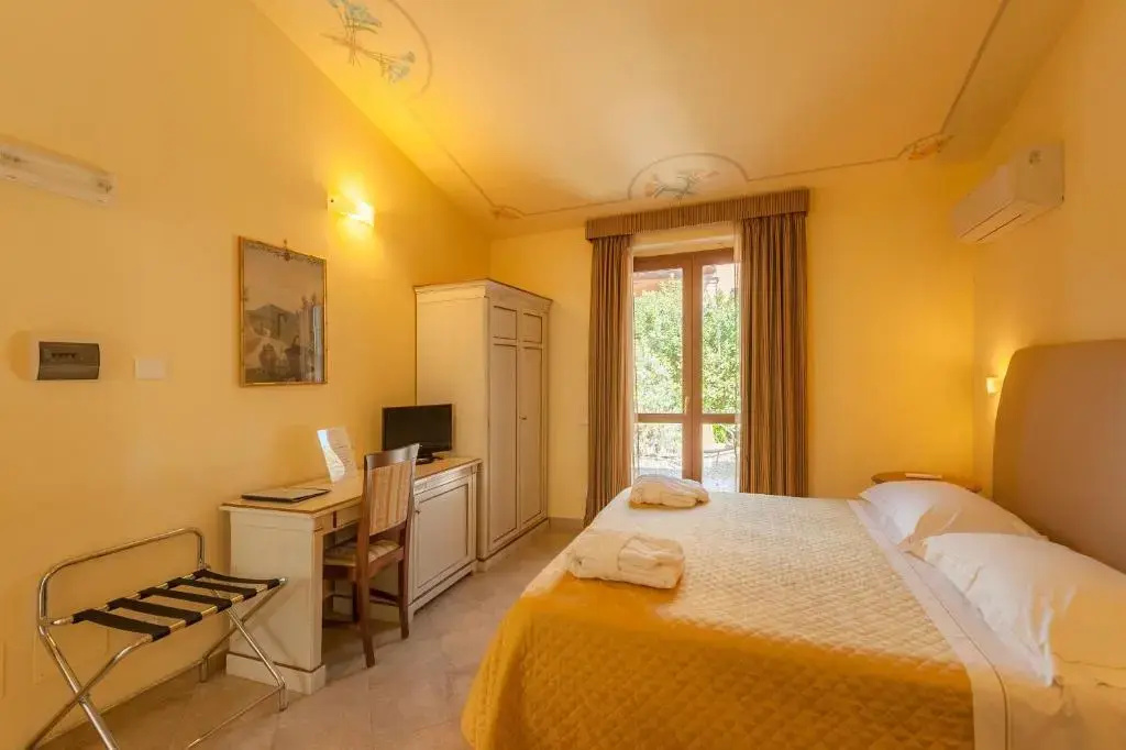Hotel Saturno Fontepura - Chambres