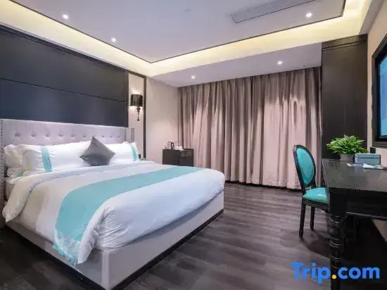 Xinliyuan Hotel - Chambres