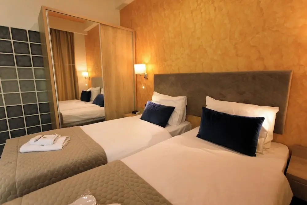 Comfort Double room with balcony and with courtyard view (twin beds)