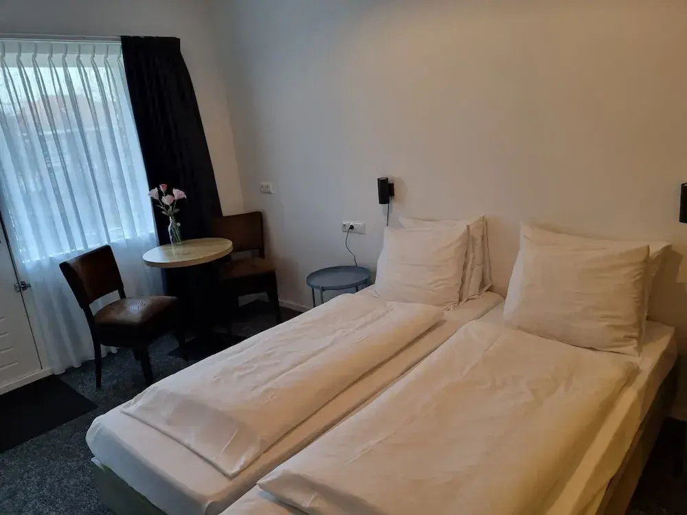Hotel De Stadsherberg - Chambres