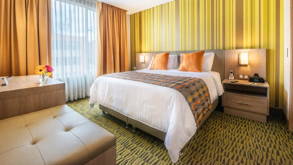 Hotel Plaza Suites - Chambres