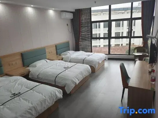 Xinxiang Hotel - Chambres