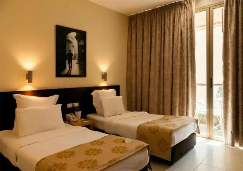 The Parisian Plaza - Chambres