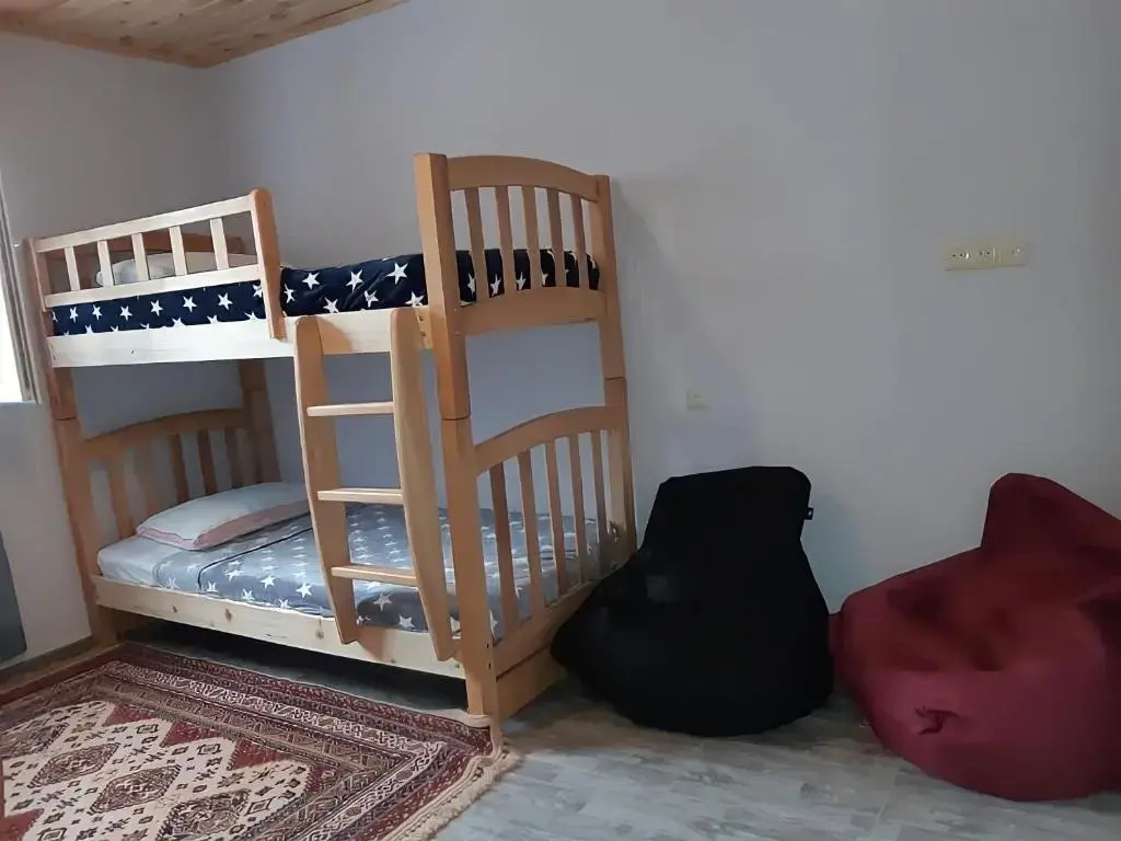 Standard Quadruple room with garden view