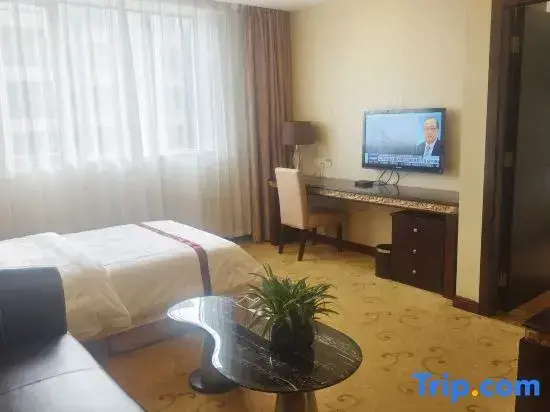 Longzhu Hotel - Chambres
