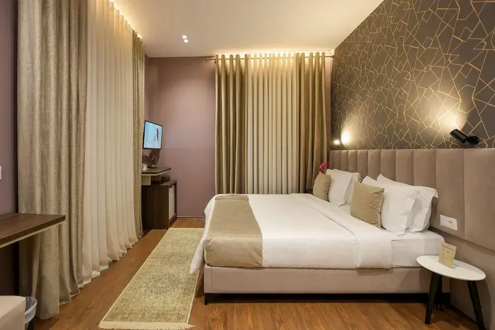 Deluxe Triple room with garden view