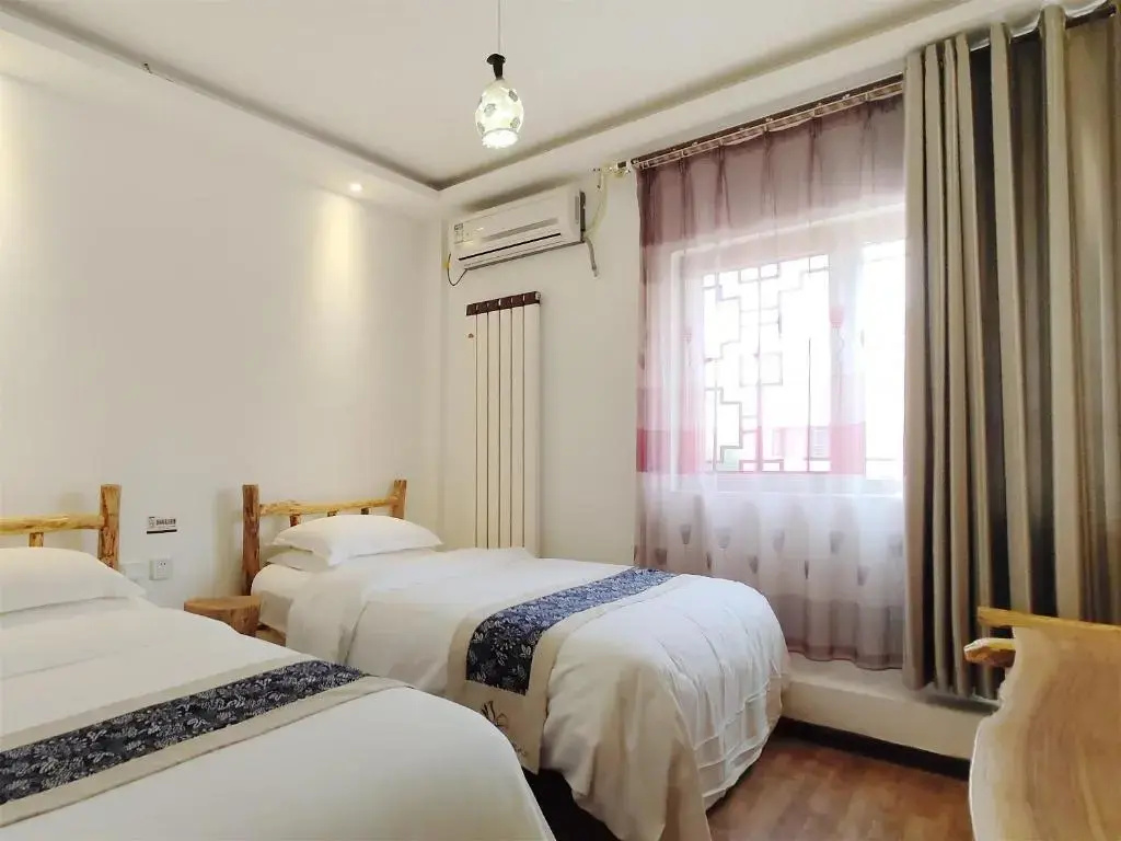 Dunhuang Silk Yododo Inn - Chambres