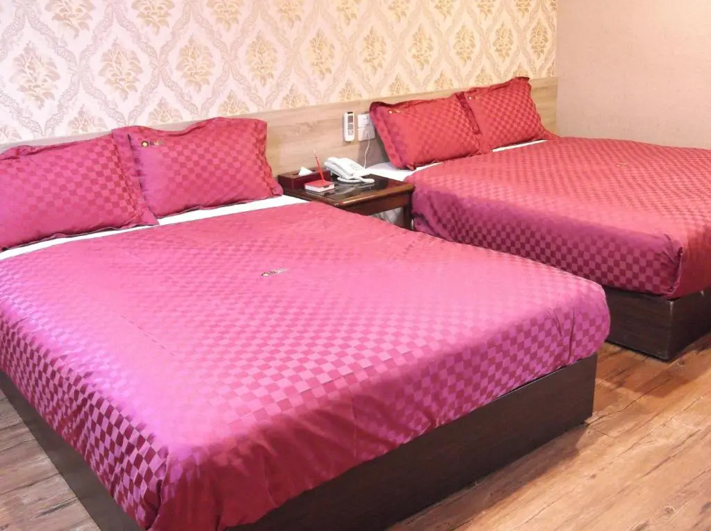 Bin Cheng Hotel - Chambres