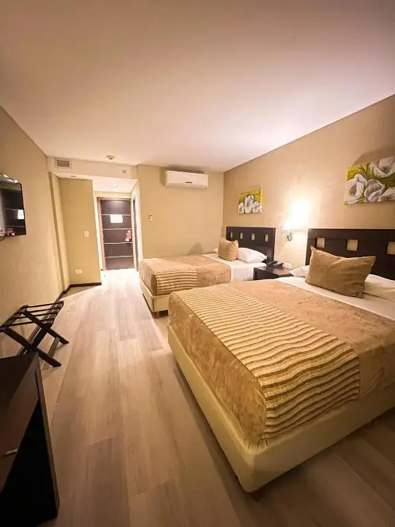 Howard Johnson by Wyndham Funes - Chambres