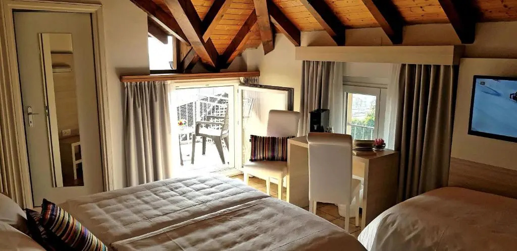 @ Home Hotel Locarno - Chambres