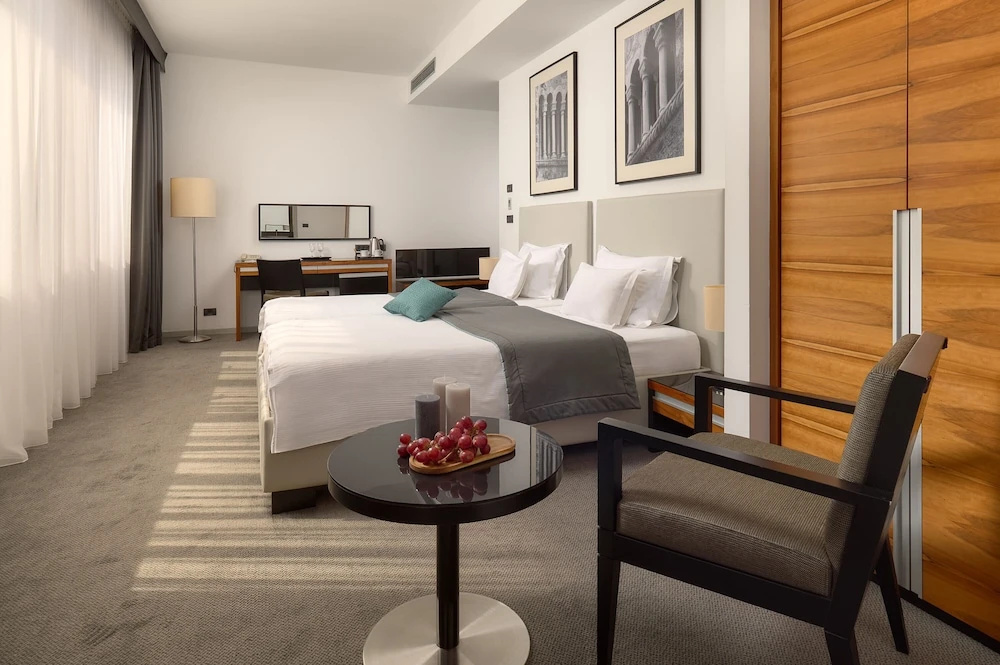 Atrium Hotel - Chambres