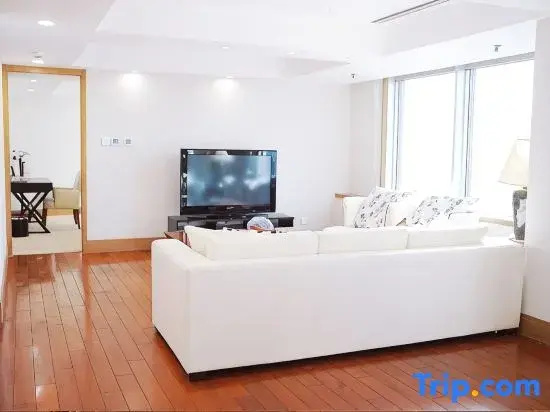 Jingguang Center Apartment Hotel - Chambres