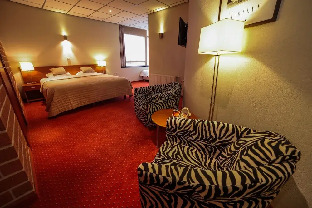 Amicitia Hotel - Chambres