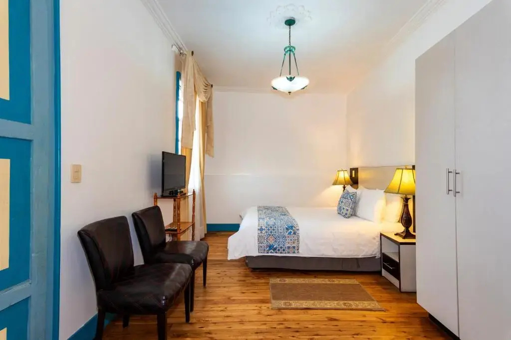 Del Parque Hotel & Suites - Chambres
