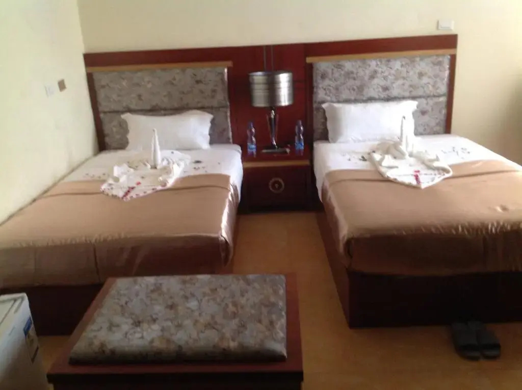 Palm Palace Hotel - Chambres