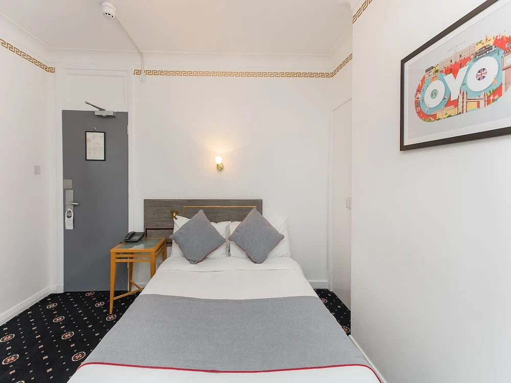 OYO Stade Court Hotel - Chambres