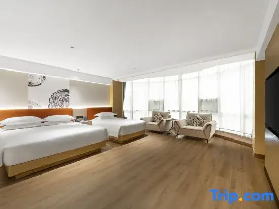 Xinyue Hotel - Chambres