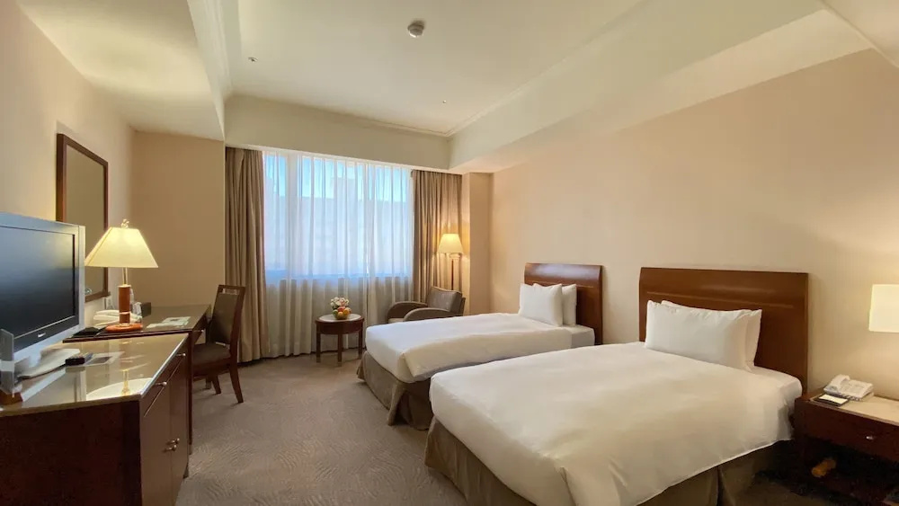 Monarch Plaza Hotel - Chambres