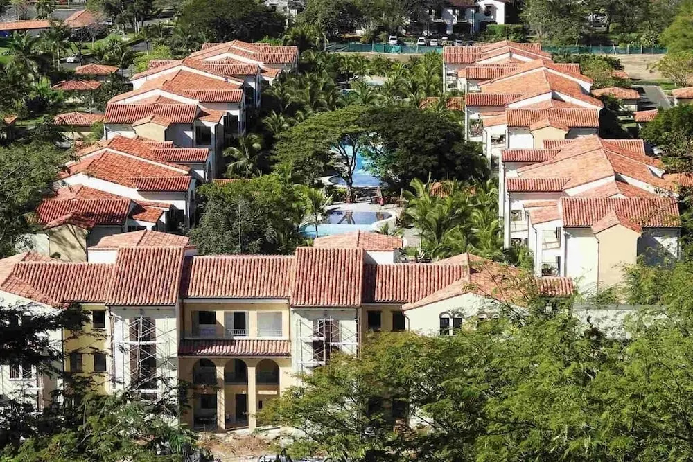 Ground-floor unit in front of lazy river pool at Pacifico in Coco