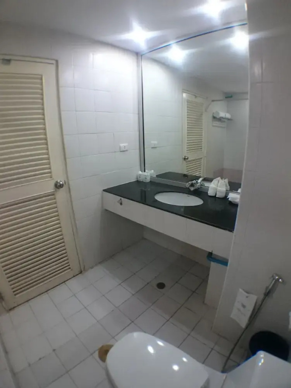 Ton Koon Hotel - Chambres