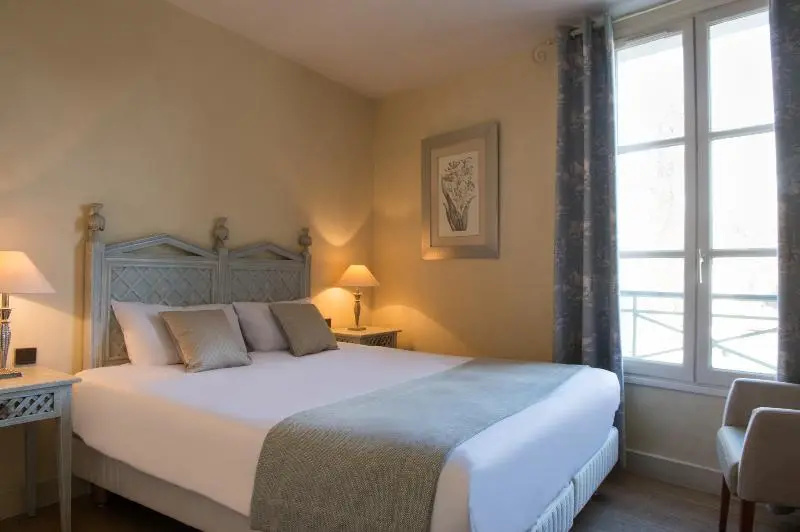 Hôtel Aux Vieux Remparts - Chambres