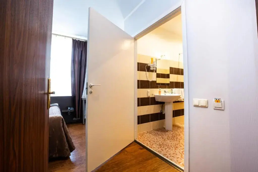 Primo Hotel - Chambres
