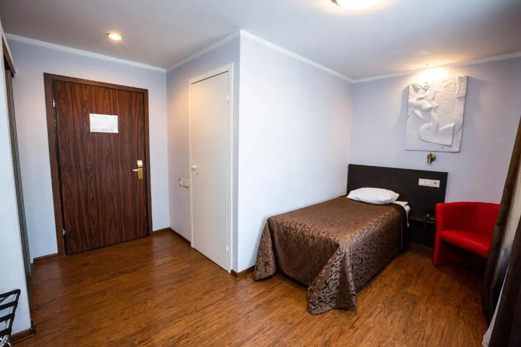 Primo Hotel - Chambres