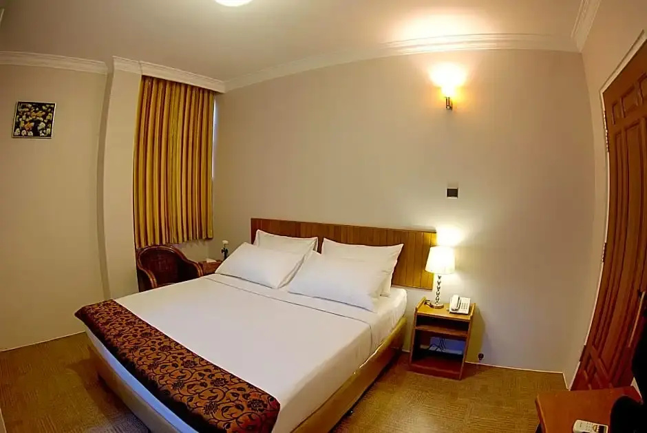 Holiday Hotel - Chambres