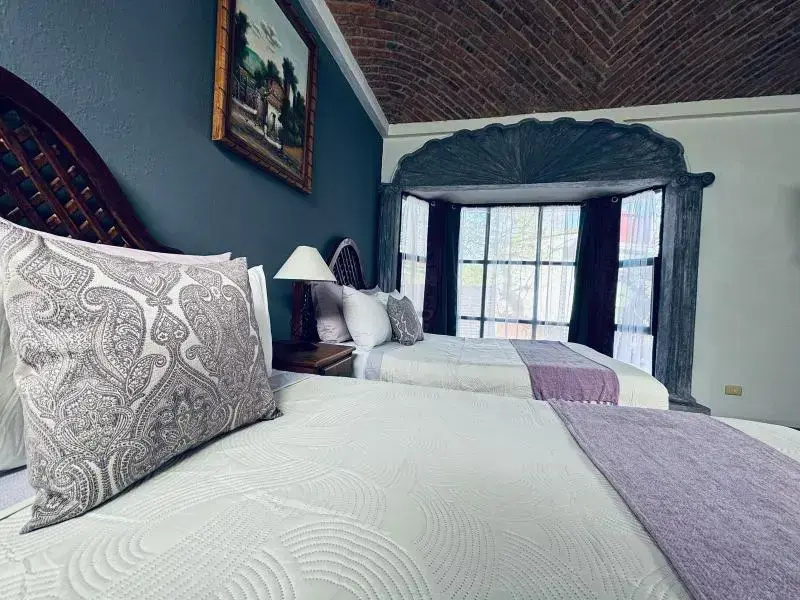 Deluxe Quadruple room with balcony