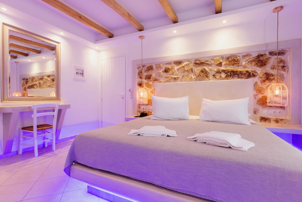 Deluxe Quadruple room with balcony and with garden view