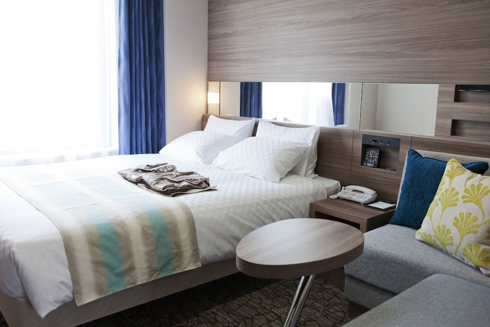 Almont Hotel Naha Kenchomae - Tap to explore photos