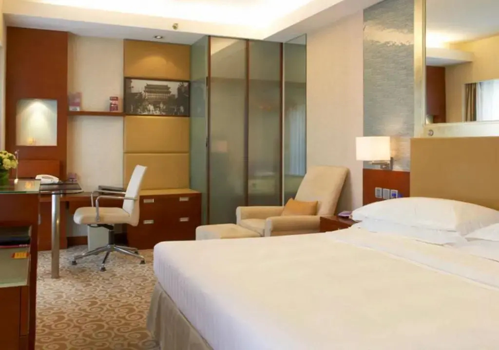 Guo Ji Yi Yuan Hotel - Chambres