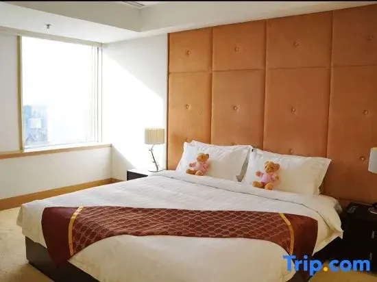 Jingguang Center Apartment Hotel - Chambres