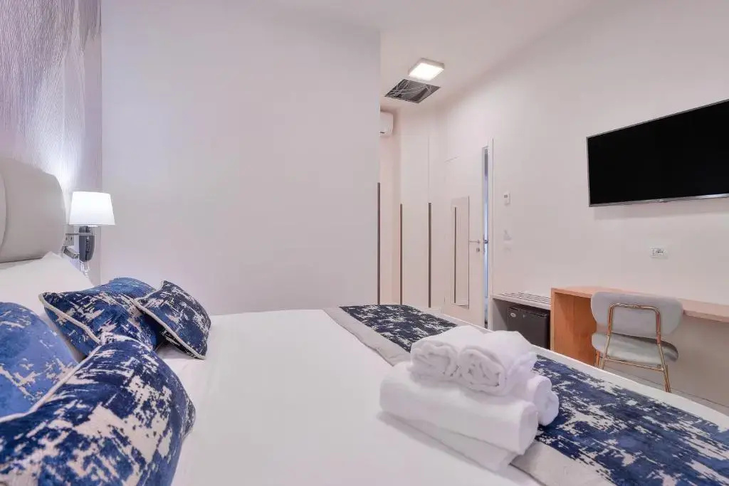 Hotel Cosmos - Chambres
