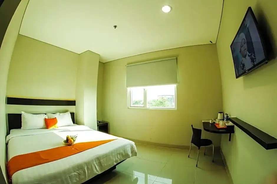 Alpha Hotel - Chambres
